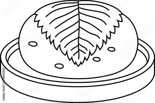 Bean paste rice cake wrapped in a cherry leaf outline