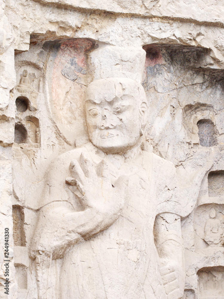 Luoyang Longmen grottoes. Buddha and the stone caves and sculptures in the Longmen Grottoes in Luoyang, China. Taken in 14th October 2018 Luoyang Longmen grottoes. Buddha and the stone caves and sculptures in the Longmen Grottoes in Luoyang, China. Taken in 14th October 2018