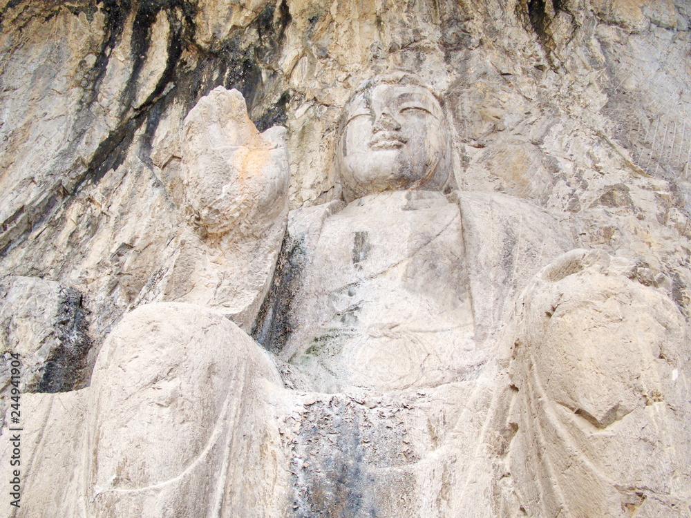 Luoyang Longmen grottoes. Buddha and the stone caves and sculptures in the Longmen Grottoes in Luoyang, China. Taken in 14th October 2018