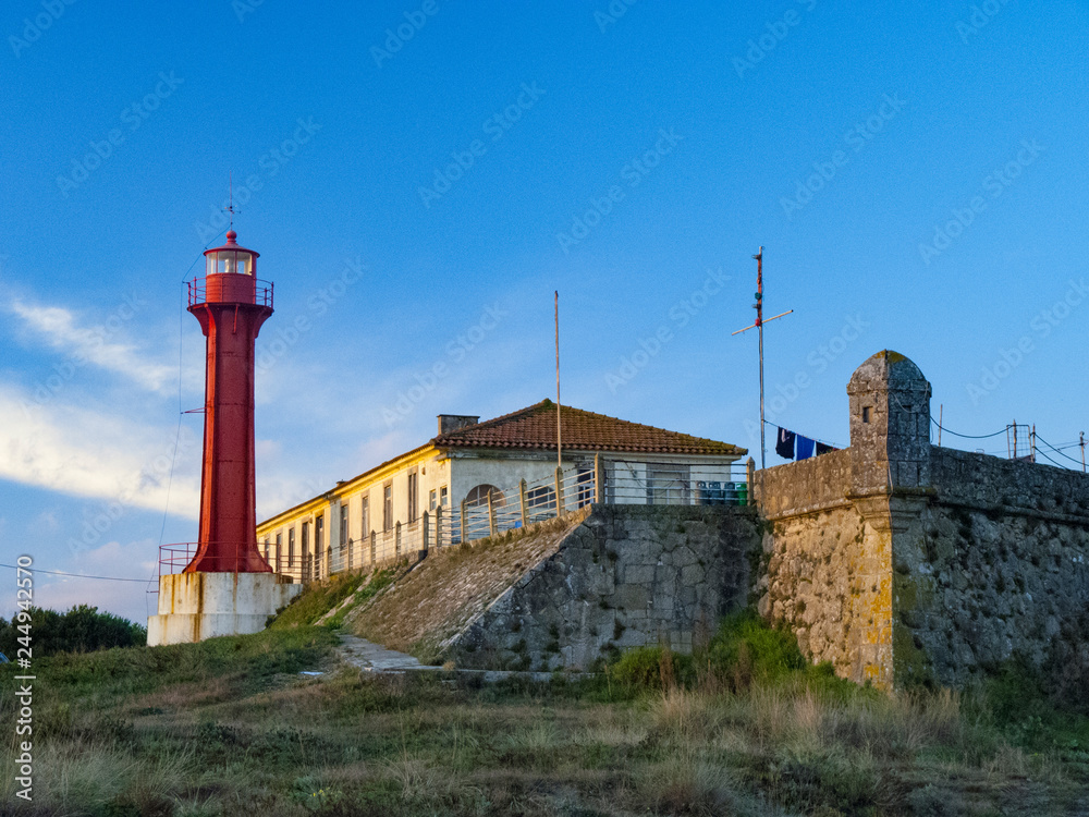 The Farol de Esposende (Esposende Lighthouse) set in front of the Fort of Sao Joao Baptista de Esposende