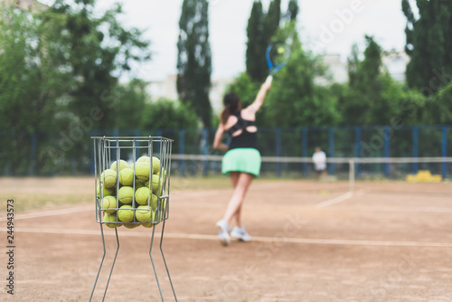 Tennis player woman . Beautiful sports women on fitness workout. Healthy lifestyle in summer environment.
