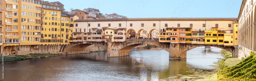 Famous landmark Ponte Vecchio bridge over Arno river in Florence, Italy