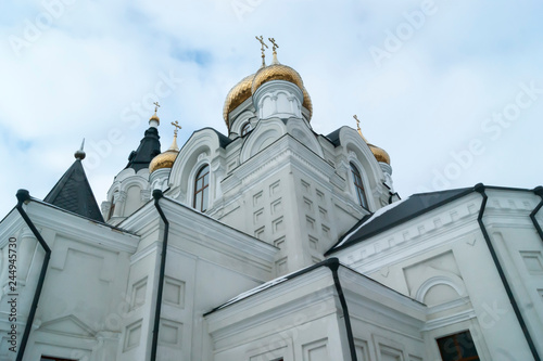 Church with golden domes and crosses photo