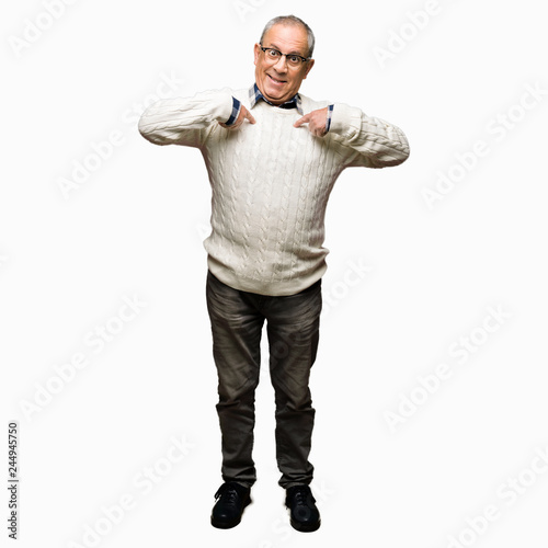 Handsome senior man wearing glasses and winter sweater looking confident with smile on face, pointing oneself with fingers proud and happy.