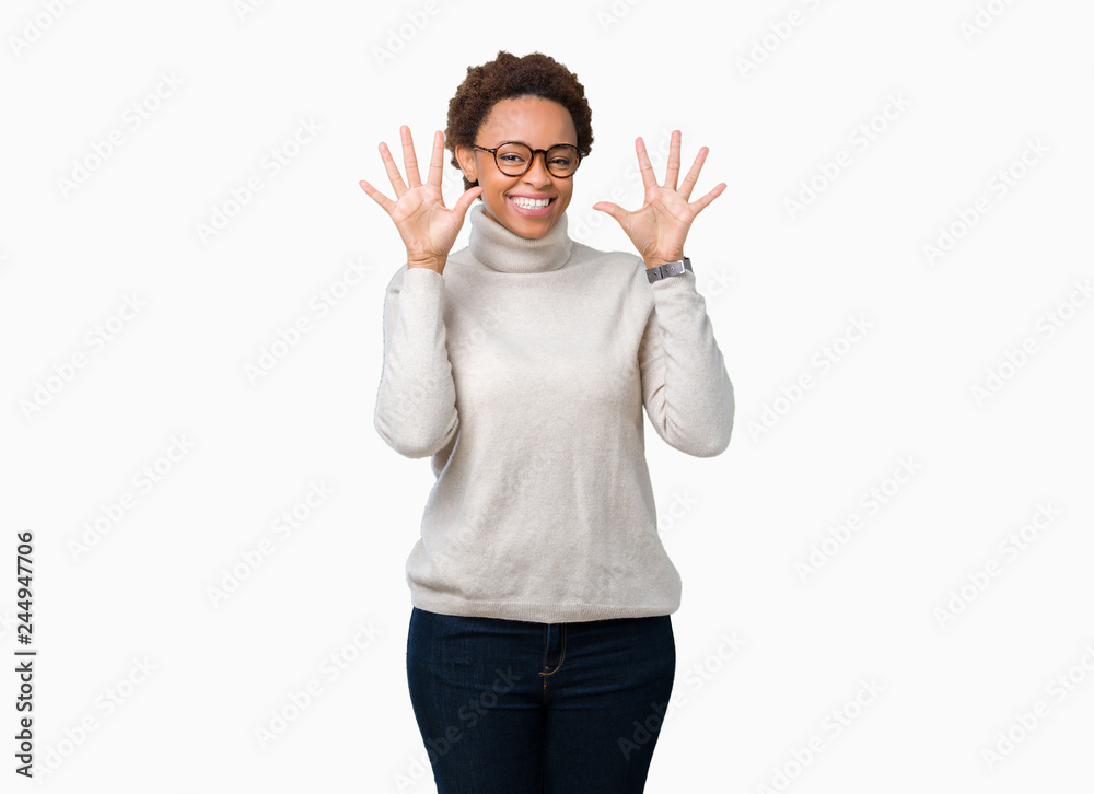 Young beautiful african american woman wearing glasses over isolated background showing and pointing up with fingers number ten while smiling confident and happy. Young beautiful african american woman wearing glasses over isolated background showing and pointing up with fingers number ten while smiling confident and happy.