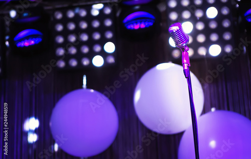 microphone on the nightclub scene. Dark atmosphere in club