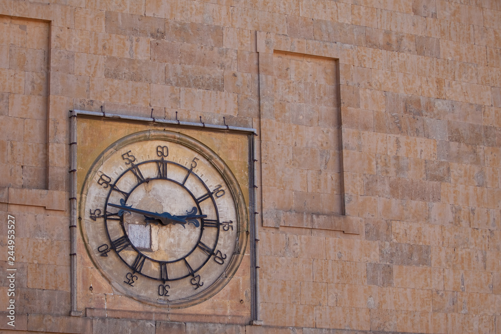 Vintage dial on a brick wall ,Salamanca, Spain
