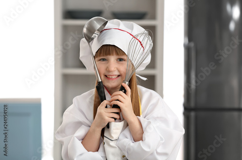 Cute little girl dressed as...