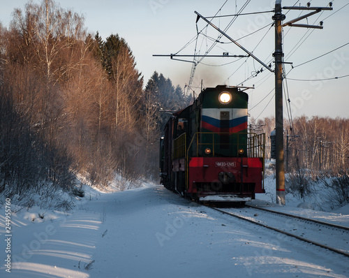 Old wagon in the winter railway