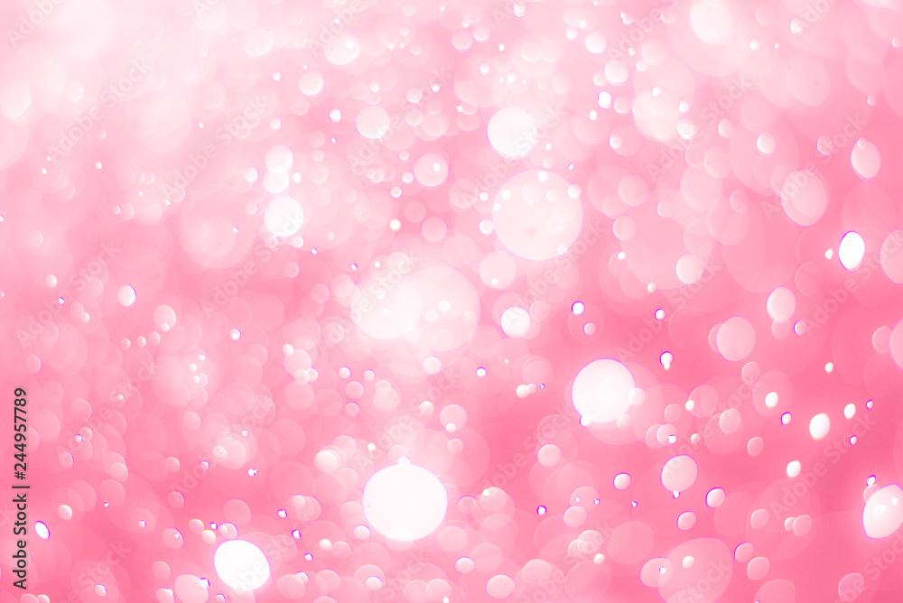 abstract bokeh light effect with soft pink background