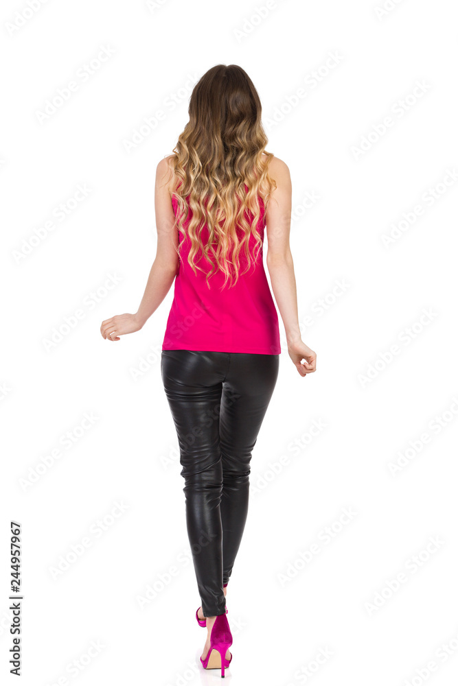 Rear View Of Walking Blond Woman In High Heels Rear View Of Walking Blond Woman In High Heels