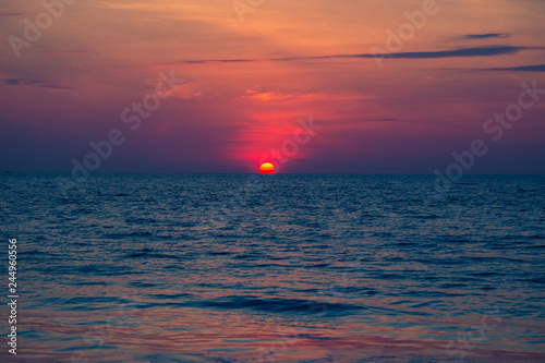 Beautiful pink sunset sun on the sea