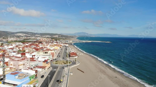 Gibraltar beach view from above, flying on the drone Spain. Beautiful beach and sea, mount Gibraltar and its surroundings in winter in December. Sea wave. Spanish slums on the shore