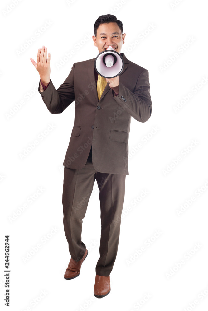 Young Businessman Smiling Shouting Using Megaphone, Marketing Promotion Concept Young Businessman Smiling Shouting Using Megaphone, Marketing Promotion Concept