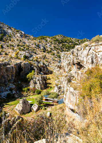 Rocks at the Baatara gorge sinkhole in Tannourine, Lebanon photo