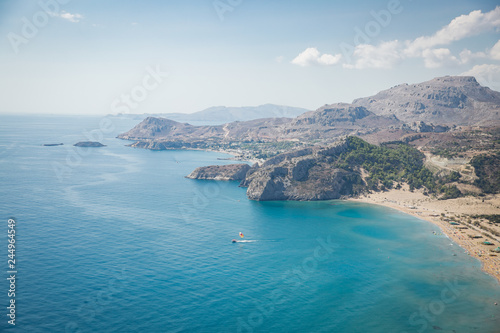 Panoramic top view of Tsampika beach, mountains and blue sea, Rhodes island, Greece. sunny weather.