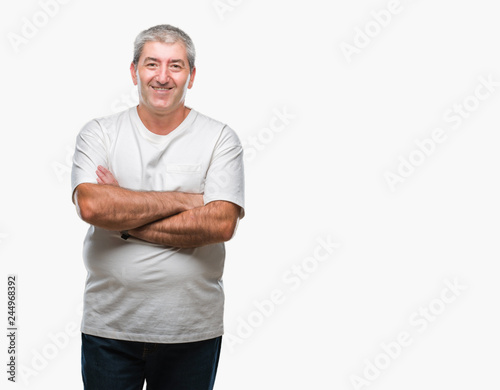 Handsome senior man over isolated background happy face smiling with crossed arms looking at the camera. Positive person.