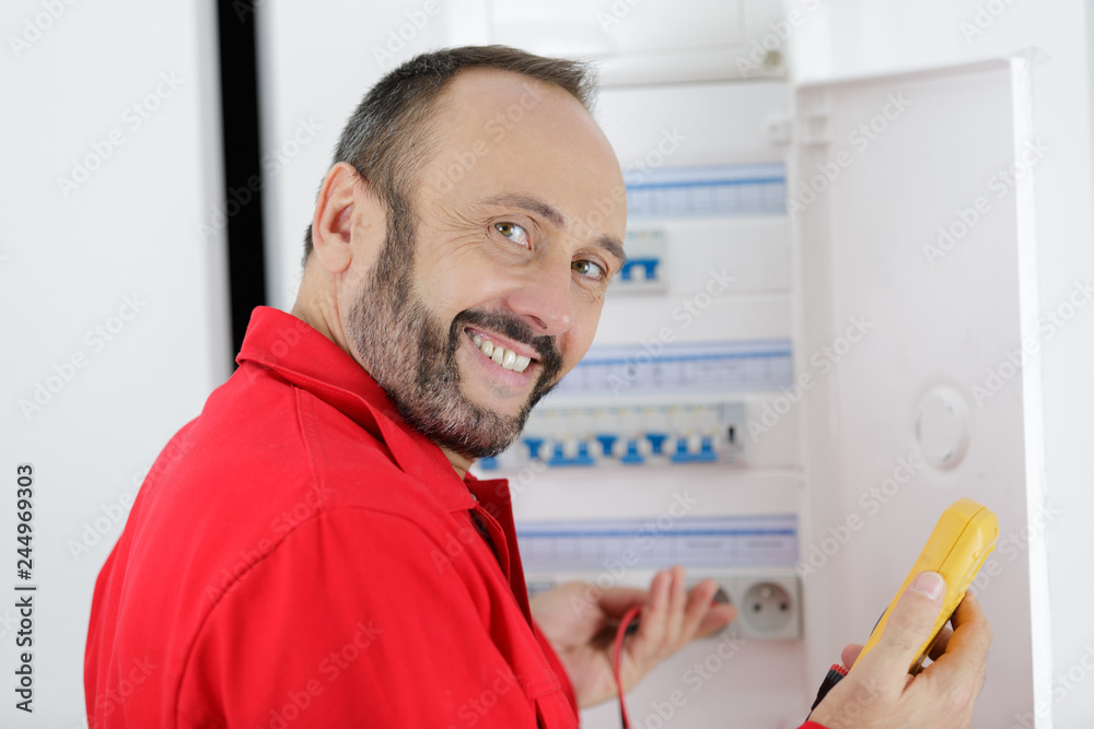 electrician installing energy saving meter