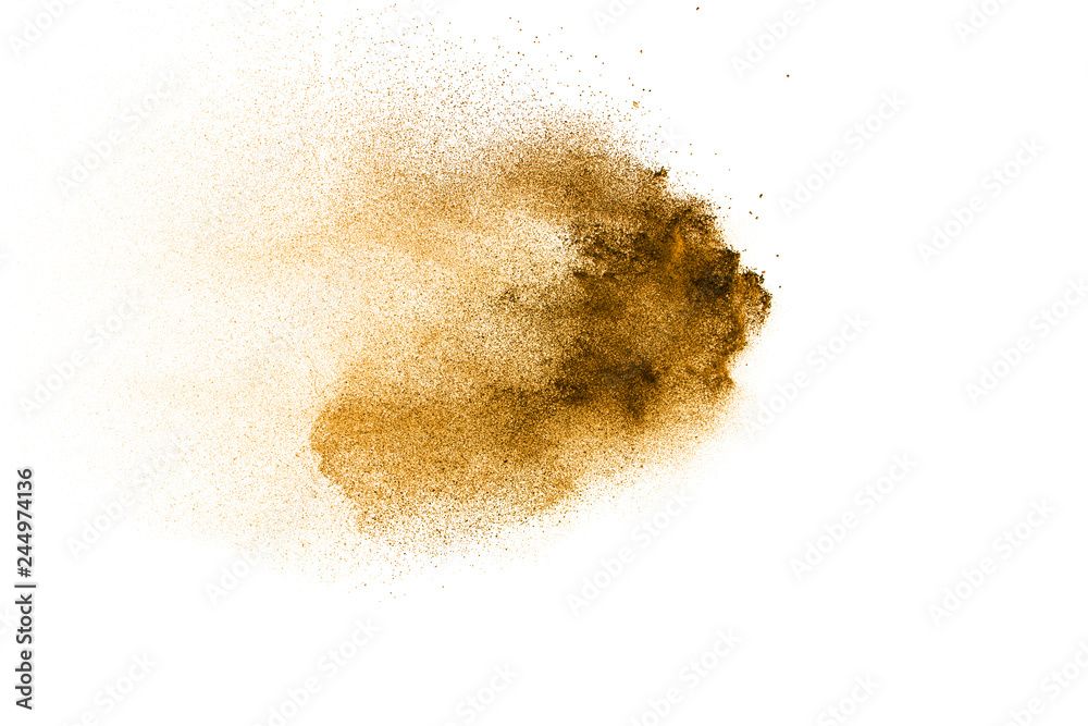 Freeze motion of brown dust explosion. Stopping the movement of brown powder. Freeze motion of brown dust explosion. Stopping the movement of brown powder.