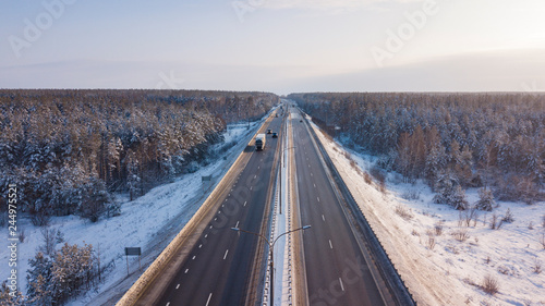 Winter aerial shot of transport junction, federal highway in Russia