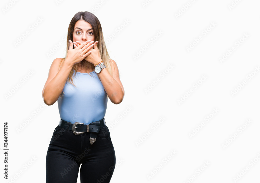 Young beautiful elegant business woman over isolated background shocked covering mouth with hands for mistake. Secret concept. Young beautiful elegant business woman over isolated background shocked covering mouth with hands for mistake. Secret concept.