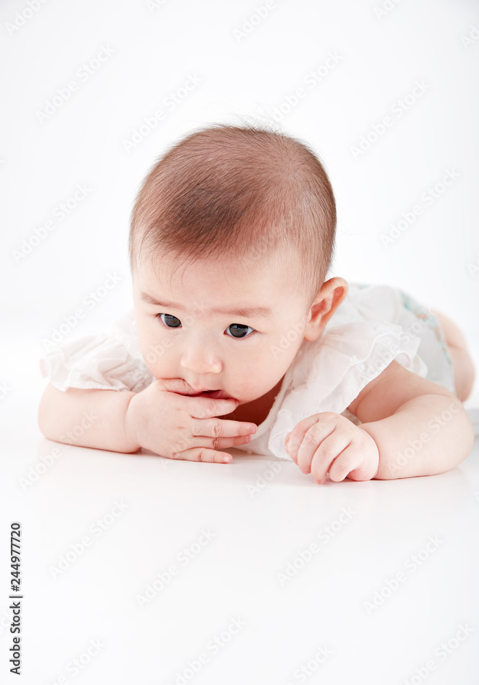 Asian cute baby, shot in studio white background Asian cute baby, shot in studio white background