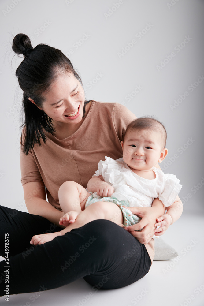 portrait of asian mother and baby lifestyle image
portrait of asian mother and baby lifestyle image
