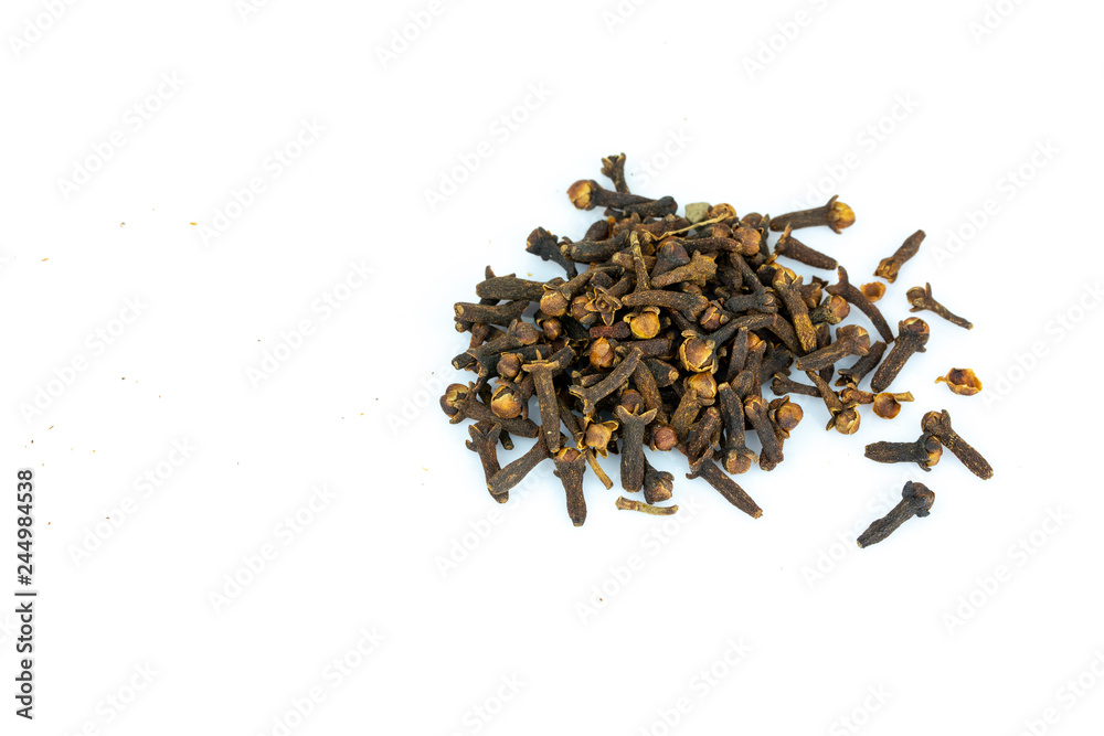 pile of cloves isolated on white background pile of cloves isolated on white background