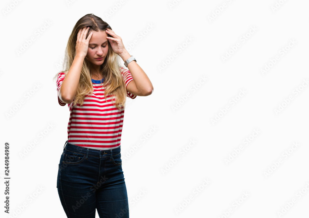 Young beautiful blonde woman over isolated background suffering from headache desperate and stressed because pain and migraine. Hands on head. Young beautiful blonde woman over isolated background suffering from headache desperate and stressed because pain and migraine. Hands on head.