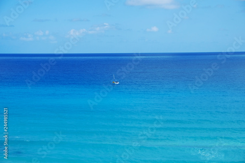Ocean water view from beach, where blue sea meets the sky.   © ccestep8