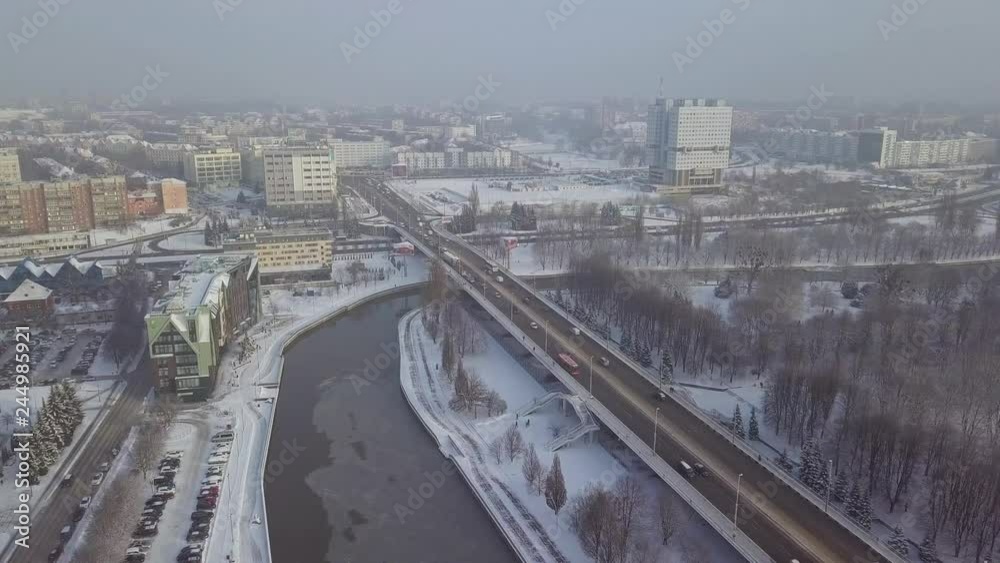 Aerial view of the traffic on bridge in Kaliningrad in snowy winter Aerial view of the traffic on bridge in Kaliningrad in snowy winter