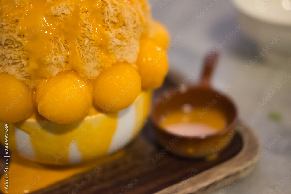 Korean shaved ice dessert with sweet toppings and fruit