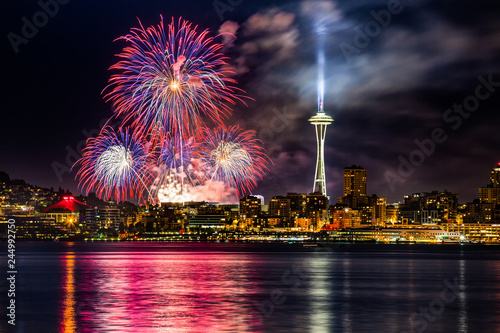 Lake Union 4th of July Fireworks and the Seattle skyline, as seen from across Elliott Bay at Seacrest Park in West Seattle