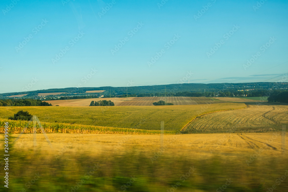 Sunny landscape of Germany mountainous field.
