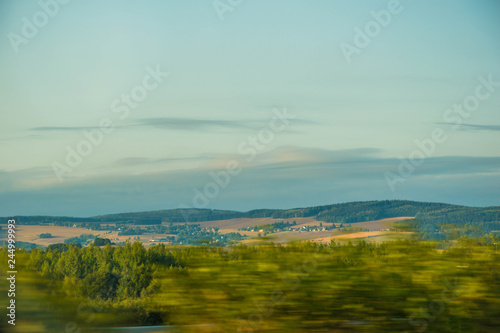 Fototapeta Naklejka Na Ścianę i Meble -  Sunny landscape of Germany mountainous field.