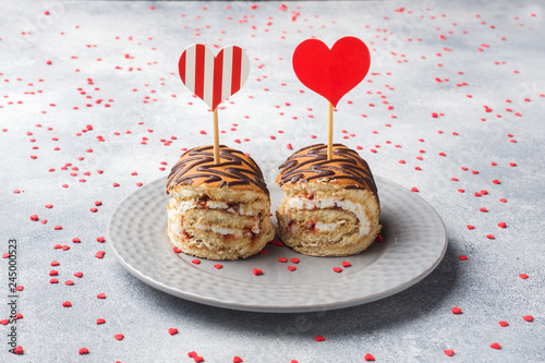 Puff pastry with cream. Concept Valentine's Day. Copy space. photo