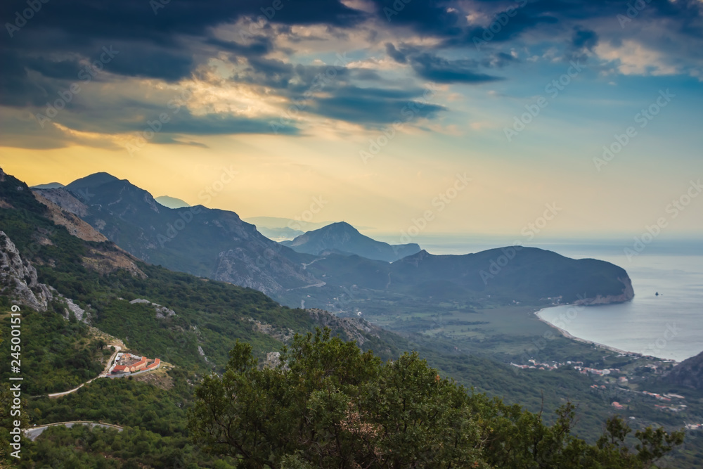 Dawn on the Adriatic coast in Montenegro. Panoramic view from the mountains. Soft focus and blurred background.