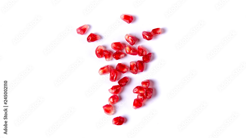 Pomegranate red fruit on white background, top view Pomegranate red fruit on white background, top view