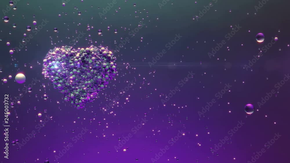 Valentines day Love intro.Shining Glass balls create valentines heart and exploding.Good for love story intro and wedding video.Valentines day memories.Twinkling heart.Pink,Blue,Purple.Type 3
