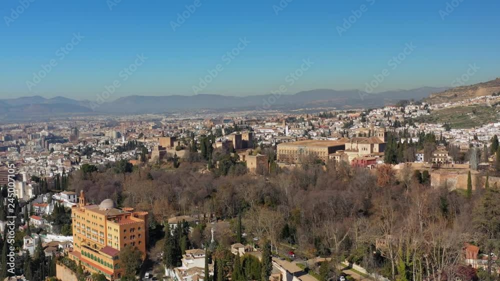 Aerial view of cityscape of Granada, famous historic city, monumental castle/palace complex of Alhambra - landscape panorama of Andalusia from above, Spain, Europe Aerial view of cityscape of Granada, famous historic city, monumental castle/palace complex of Alhambra - landscape panorama of Andalusia from above, Spain, Europe