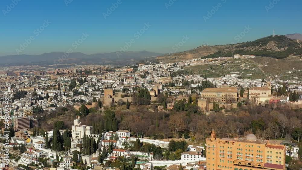 Aerial view of cityscape of Granada, famous historic city, monumental castle/palace complex of Alhambra - landscape panorama of Andalusia from above, Spain, Europe Aerial view of cityscape of Granada, famous historic city, monumental castle/palace complex of Alhambra - landscape panorama of Andalusia from above, Spain, Europe