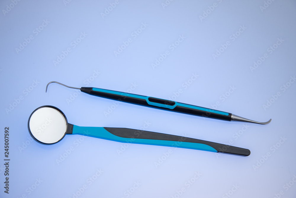 Dentist tools :Dental mirror and probe, periodontal scaler Dentist tools :Dental mirror and probe, periodontal scaler