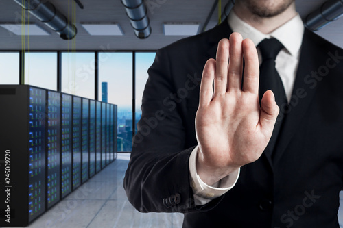 businessman in modern server room stop gesture with his hands - 3D Illustration