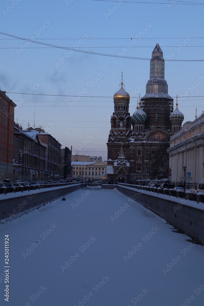winter St. Petersburg frozen river in the city