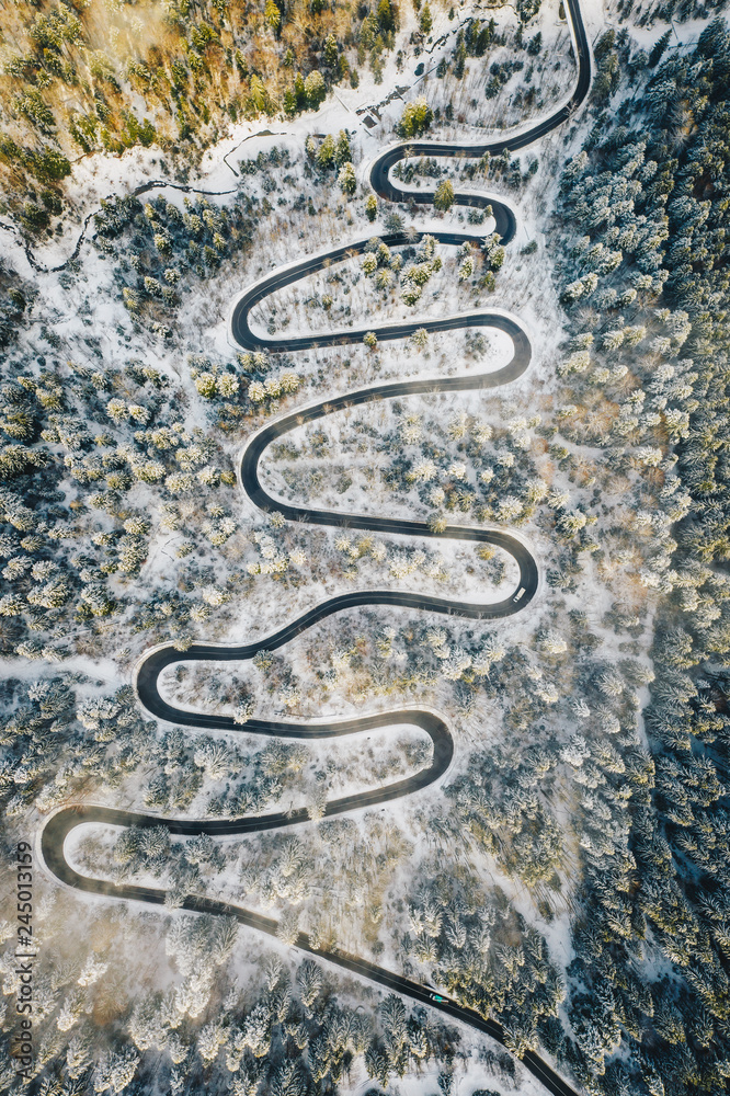 Winding road in severe winter conditions