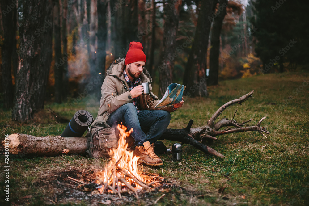 Young blogger photographer travel in mountain forest Young blogger photographer travel in mountain forest