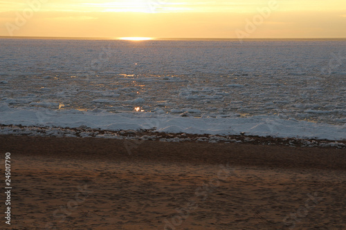 Beautiful coastal landscape,Baltic Sea,Latvia, Saulkrasti.  Naturally. Winter sunrise snow Baltic beach. Snow and ice  © dainav