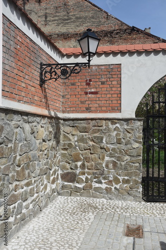 PASSAGE  with stone and wrought iron in Bistrita photo