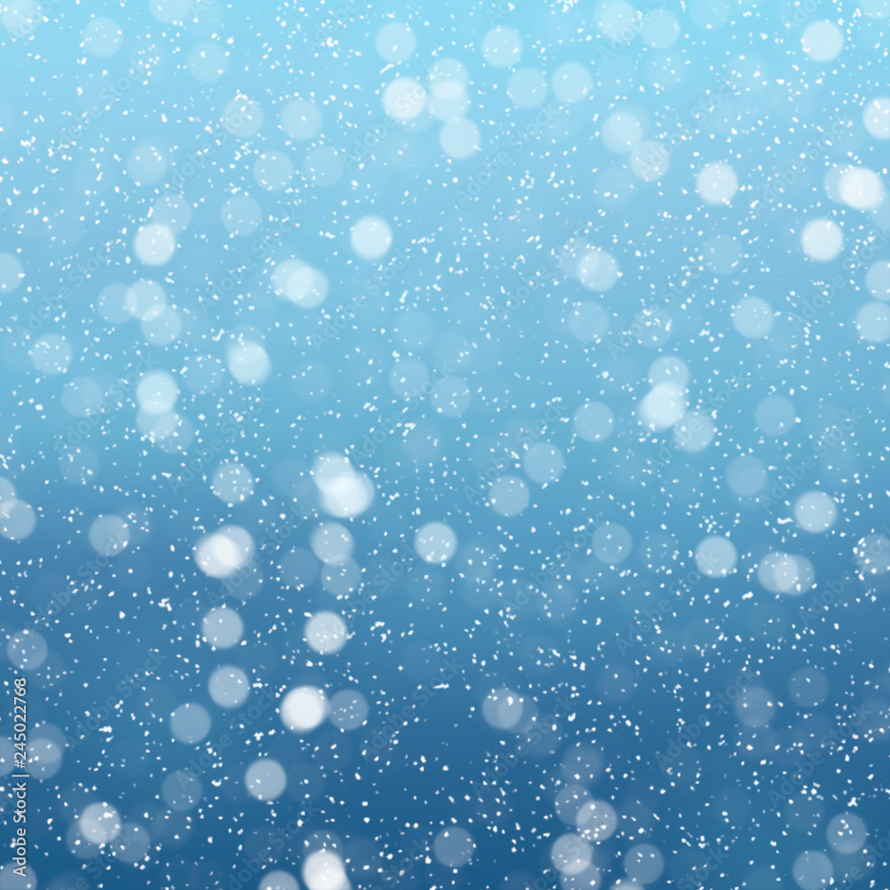 Snow falls on winter blue sky background