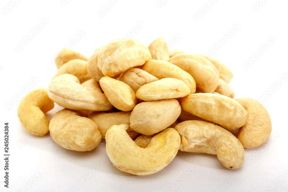 Cashew nuts on white background. Isolated nuts. Natural product. Cashew nuts on white background. Isolated nuts. Natural product.